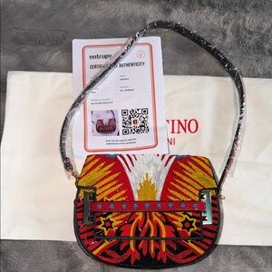 Brand new Valentino Garavani RARE FIND RED AND YELLOW SEQUINS N BEADS.